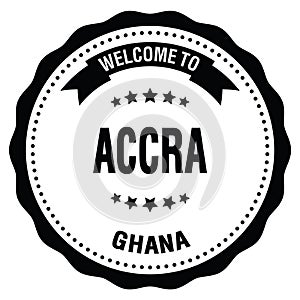 WELCOME TO ACCRA - GHANA, words written on black stamp