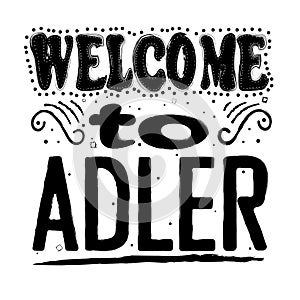 Welcome to Adler - inscription, black letters on white background.