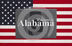 Welcome to Alabama message with flag