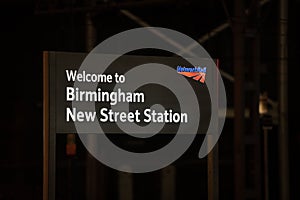 Welcome to Birmingham New Street train station Grand Central sign at night illuminated with Network Rail logo