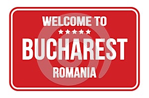 WELCOME TO BUCHAREST - ROMANIA, words written on red street sign stamp