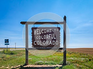 Welcome to colorful Colorado road sign at state line