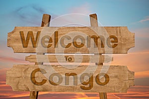 Welcome to Congo sing on wood background