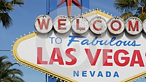 Welcome to fabulous Las Vegas retro neon sign in gambling tourist resort, USA. Iconic vintage banner as symbol of casino