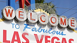 Welcome to fabulous Las Vegas retro neon sign in gambling tourist resort, USA. Iconic vintage banner as symbol of casino