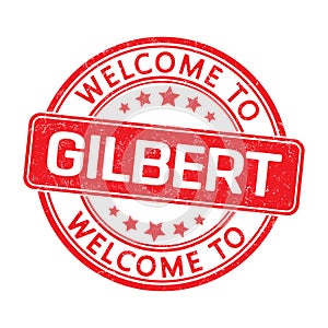Welcome to GILBERT. Impression of a round stamp with a scuff
