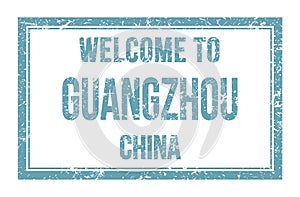 WELCOME TO GUANGZHOU - CHINA, words written on light blue rectangle stamp