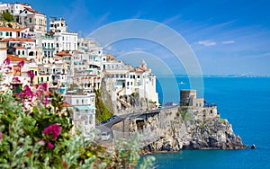 Welcome to Italy concept image. Beautiful Amalfi on hills leading down to coast, Campania, Italy