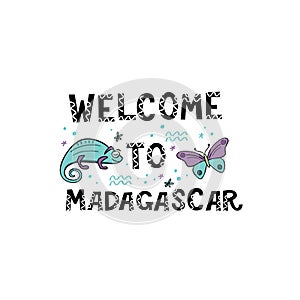 Welcome to Madagascar. Handlettering frase with handdrawn chameleon and butterfly with design elements.
