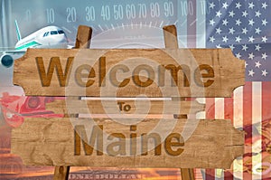 Welcome to Maine state in USA sign on wood, travell theme