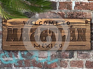 Welcome to Mazatlan Mexico Wood Plaque on Brick Wall photo