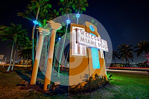 Welcome to Miami Beach sign at night