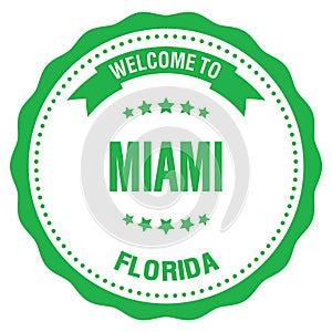 WELCOME TO MIAMI - FLORIDA, words written on green stamp