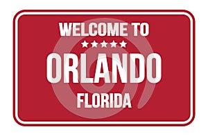 WELCOME TO ORLANDO - FLORIDA, words written on red street sign stamp