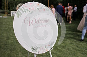 Welcome to our wedding sign in the park