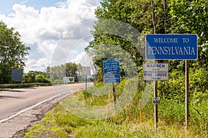 The Welcome to Pennsylvania state line sign on US Route 62 in Warren County, Pennsylvania, USA