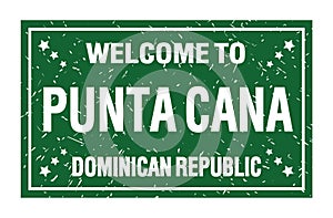 WELCOME TO PUNTA CANA - DOMINICAN REPUBLIC, words written on green rectangle stamp