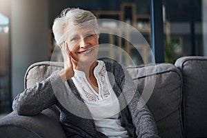 Welcome to retirement, time to rest. Portrait of a senior woman relaxing on the sofa at home.