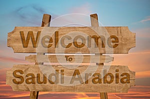 Welcome to Saudi Arabia sign on wood background