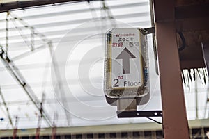 Welcome to the second floor, upstair sign to go up with arrow