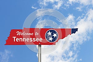 Welcome to the state of Tennessee road sign in the shape of the state map with the flag