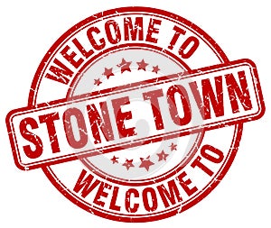 Welcome to Stone Town red round stamp