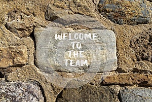 Welcome to the team symbol. Concept words Welcome to the team on beautiful stone. Beautiful stone wall background. Business,