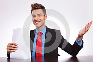 Welcomming man at his desk
