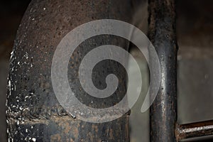 Weld on the corner of an old pipe