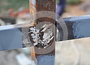 Weld on a Steel Iron Bar for a New Fence Frame.