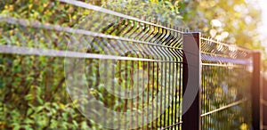 Welded metal wire mesh panel fence. banner