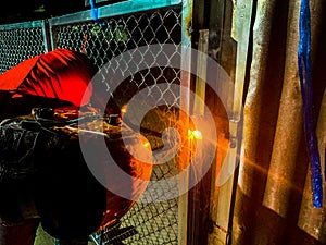 Workers are welding structural steel.