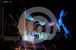 Welder is fabricated use gas metal arc welding process photo