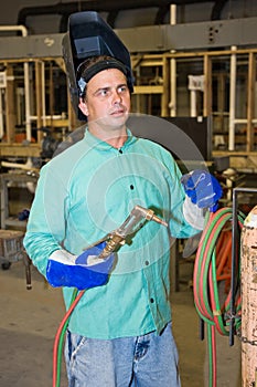 Welder on Factory Floor