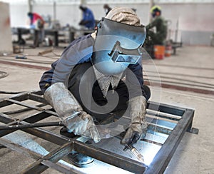 Welder in factory