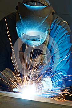 Welder at factory workshop