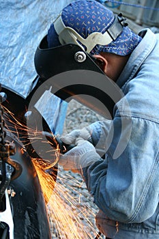 Welder with grinder