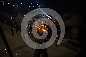 welder, mig or tig welding, craftsman, erecting technical steel Industrial, pretty sparks from weld pistol, steel welder in