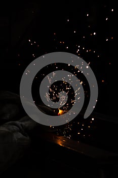 welder, mig or tig welding, craftsman, erecting technical steel Industrial, pretty sparks from weld pistol, steel welder in