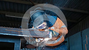Welder operator in the process of constructing metal structures using TIG MIG MAG welding techniques