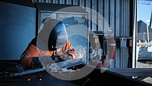 Welder operator in the process of constructing metal structures using TIG MIG MAG welding techniques