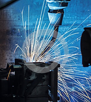 Welder robots movement in a car factory