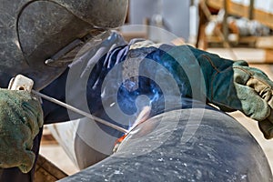 Welder weld root weld from inside of big pipe