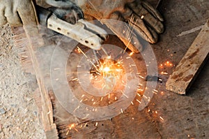 Welder Welding Sparks steel in factory