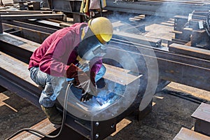 The welder is welding a steel structure work