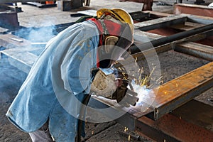 The welder is welding a steel structure work