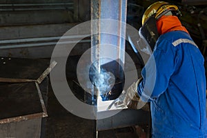 The welder is welding a steel structure work