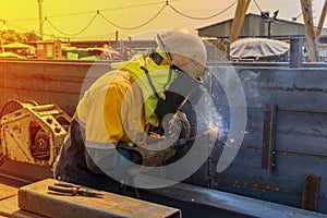 The welder is welding a steel structure work