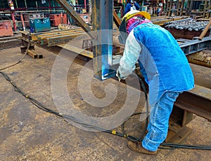 The welder is welding a steel structure work