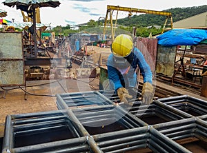 The welder is welding a steel structure work